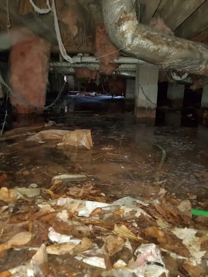 Crawl space flood assessment for Commercial Water Damage Restoration in West Des Moines